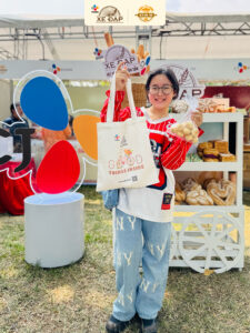 Actress Ngan Chi visits the Bicycle Flour stand.